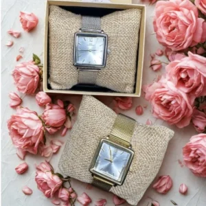 montre femme Lucia est disponible en doré et en argenté avec un bracelet maille milanaise réglable et un cadran rectangle élégant